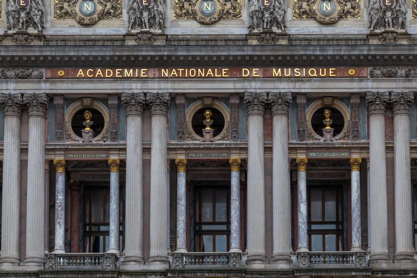 Ornate neoclassical facade detail, Paris